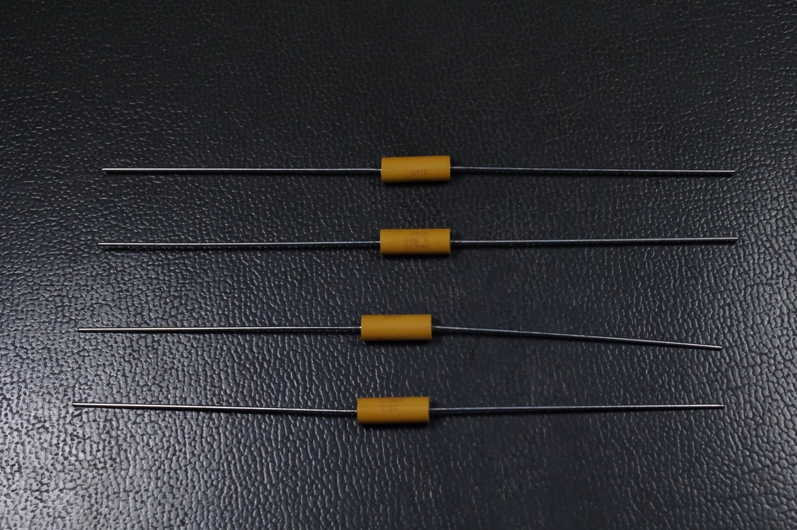 Lot of 4 C192T104K5X5CS Kemet Capacitor .1uF 50V 10% CKR14BX104KS M39014/05-2291
