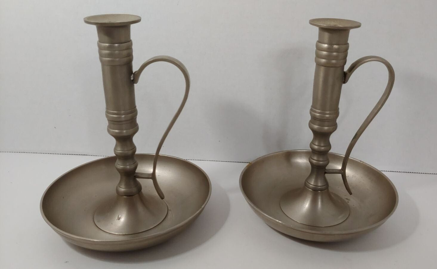 Pier 1 older metal candlesticks w/ handles possibly pewter or brushed nickel