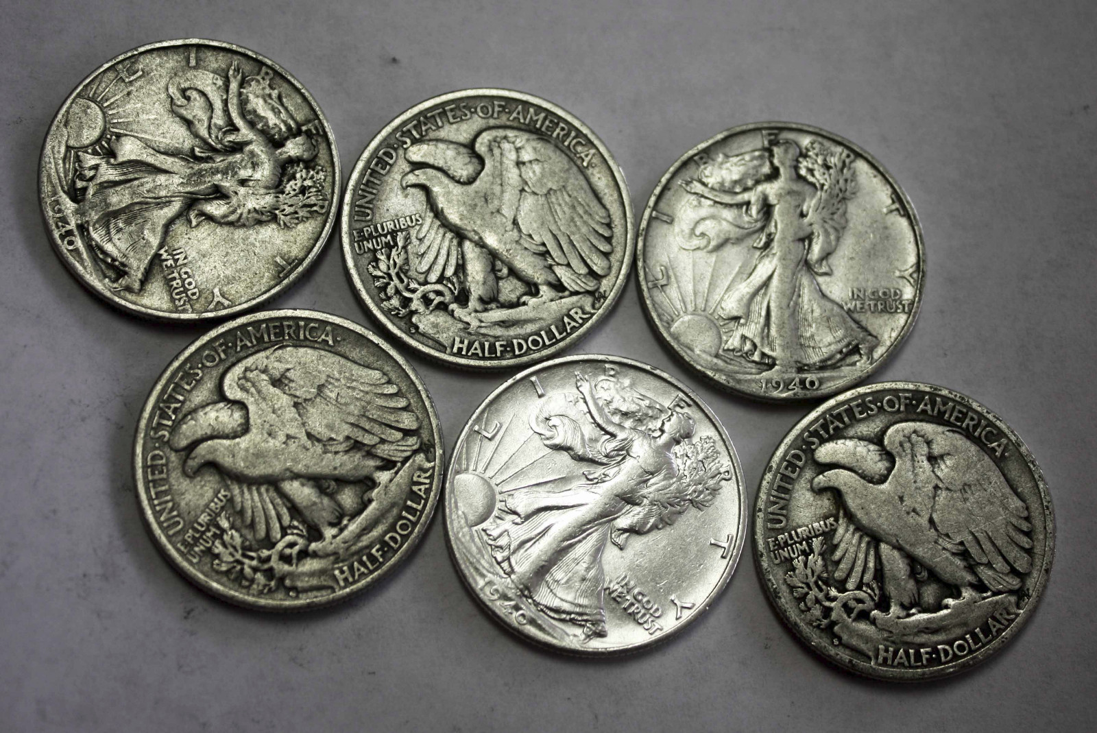 1940-s Walking Liberty Half. Average Grade of Coin You Receive is Photographed