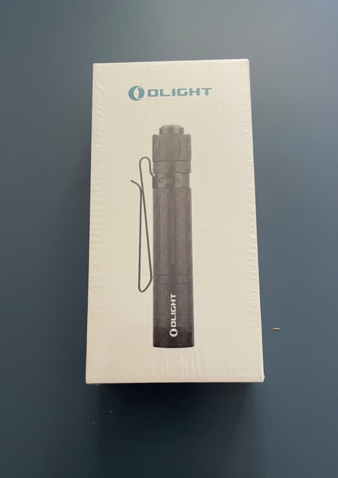 Olight i3T EOS Carbon Fiber LED Flashlight Black AAA Battery 1x