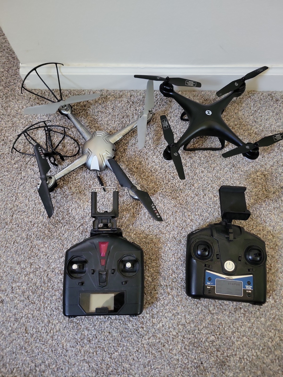 Holy Stone And Propel GPS Quadcopter Drone  SET OF 2 & Remote Control UNTESTED