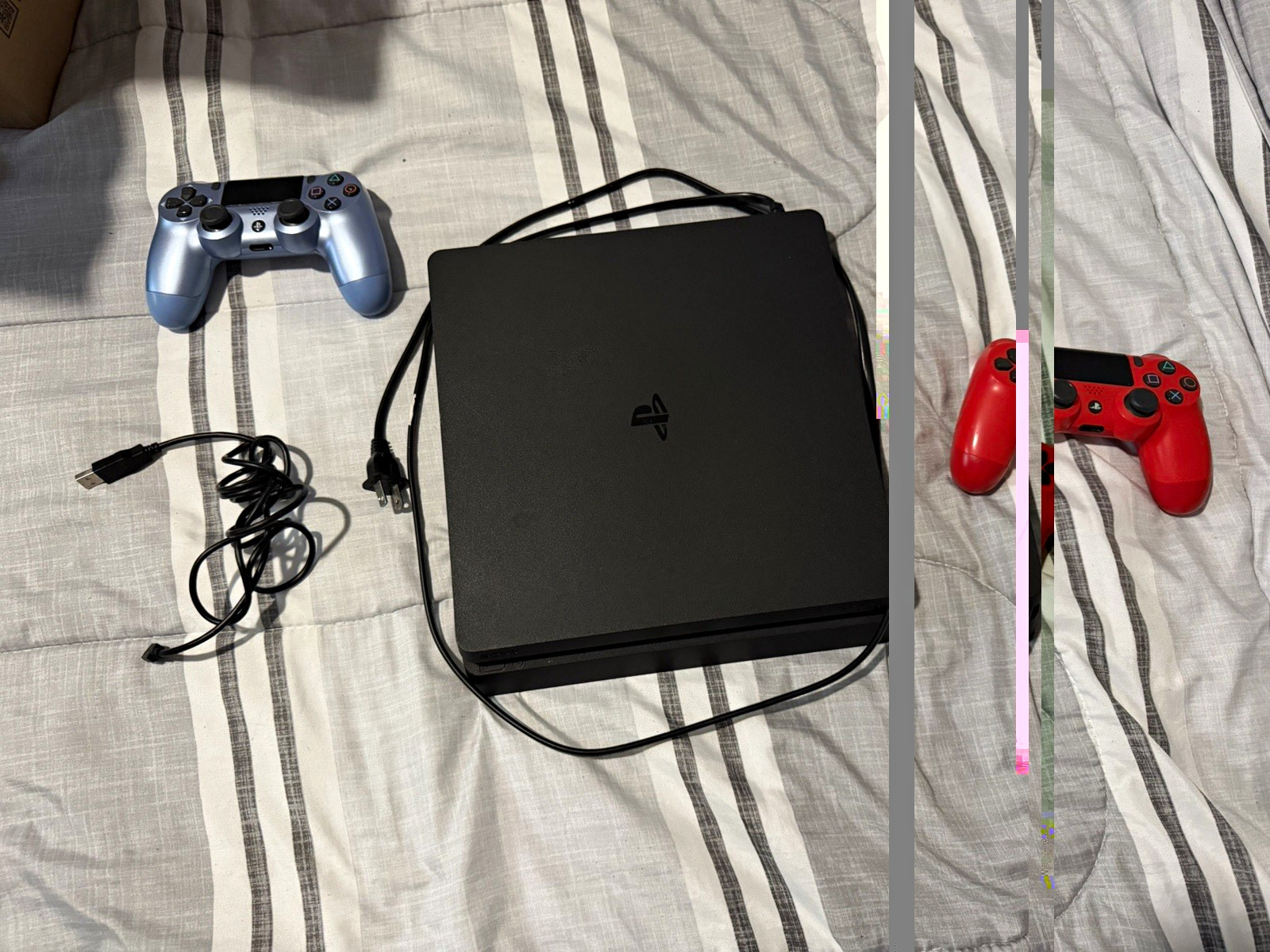 PlayStation 4 w/ 2 controllers and usb cable good condition