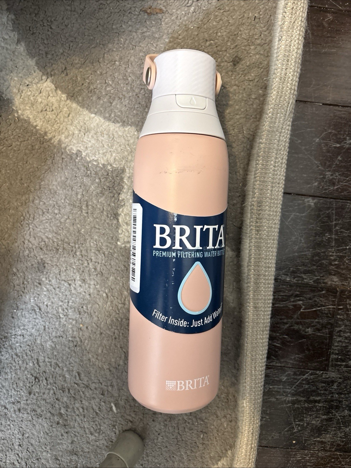 brita 20 oz filtering water bottle in rose pink