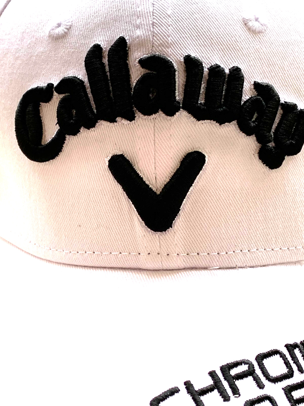 White Golf Cap w/ 3D Embroidery in Black. Popular Golf Company. Factory 2nd
