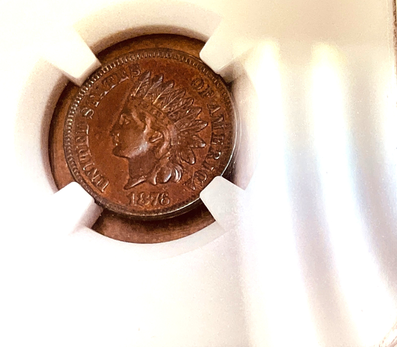 1876 Indian Head Cent - NGC AU Details - lightly cleaned.