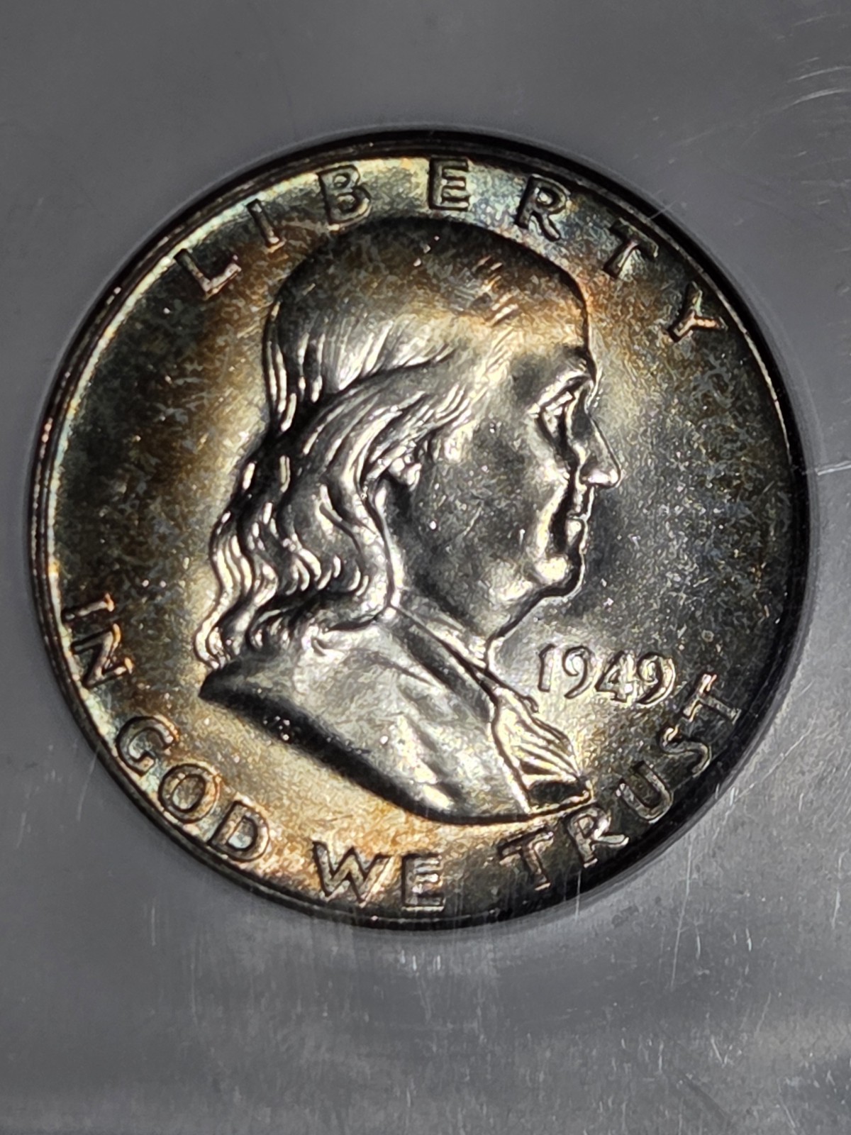 1949 50c Franklin Half NGC MS64 FBL Toned