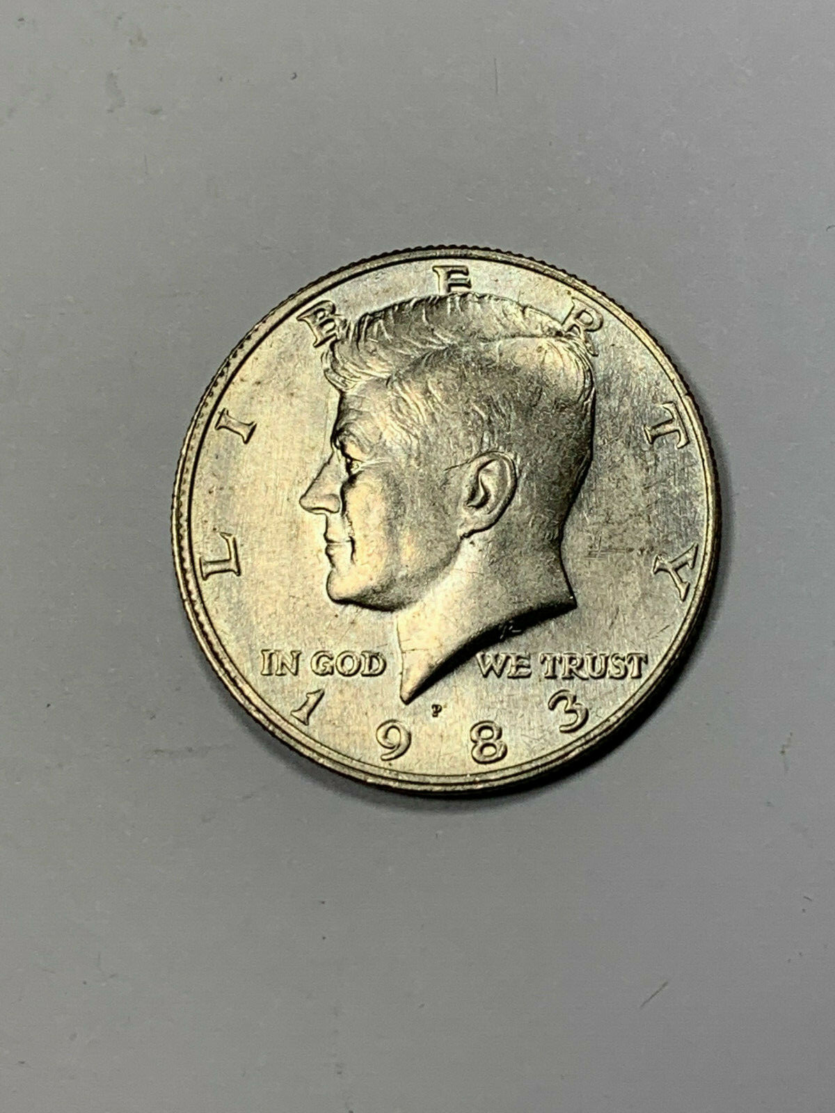 1983-P Almost Uncirculated (AU) Clad Kennedy Half Dollar