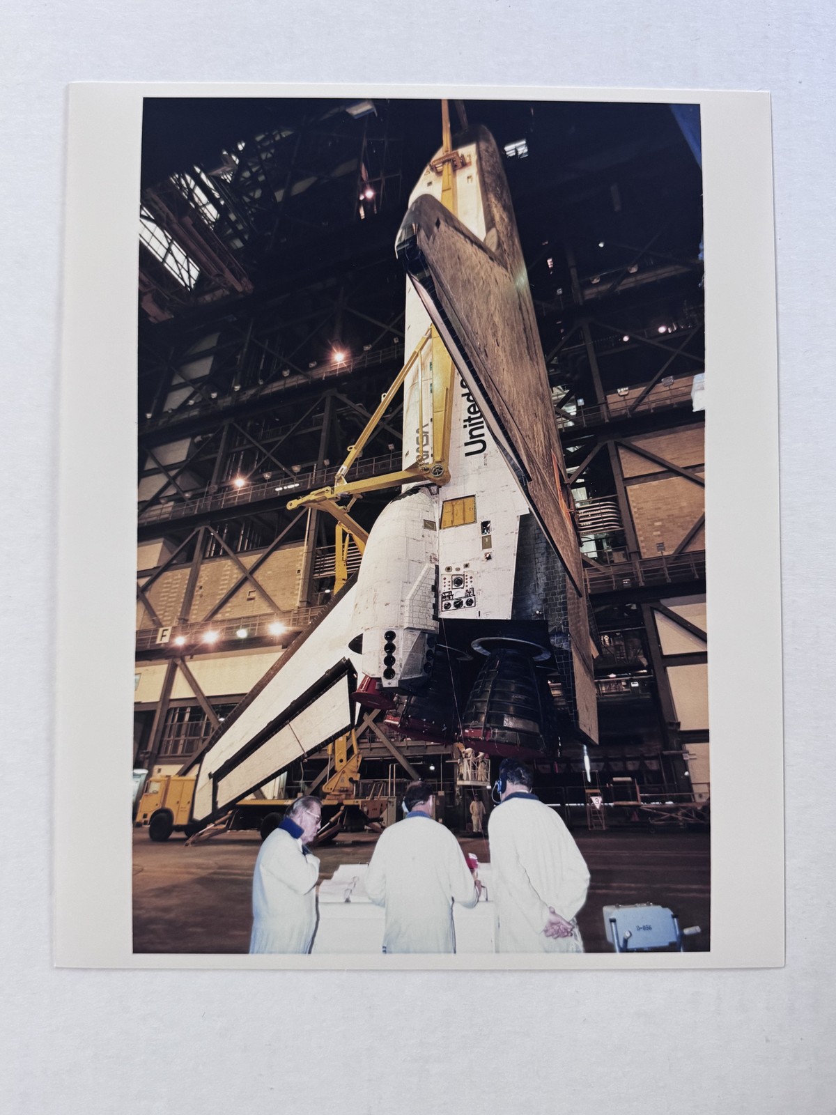 NASA STS-60 Discovery Hoisted into VAB High Bay 3 Press Photo B