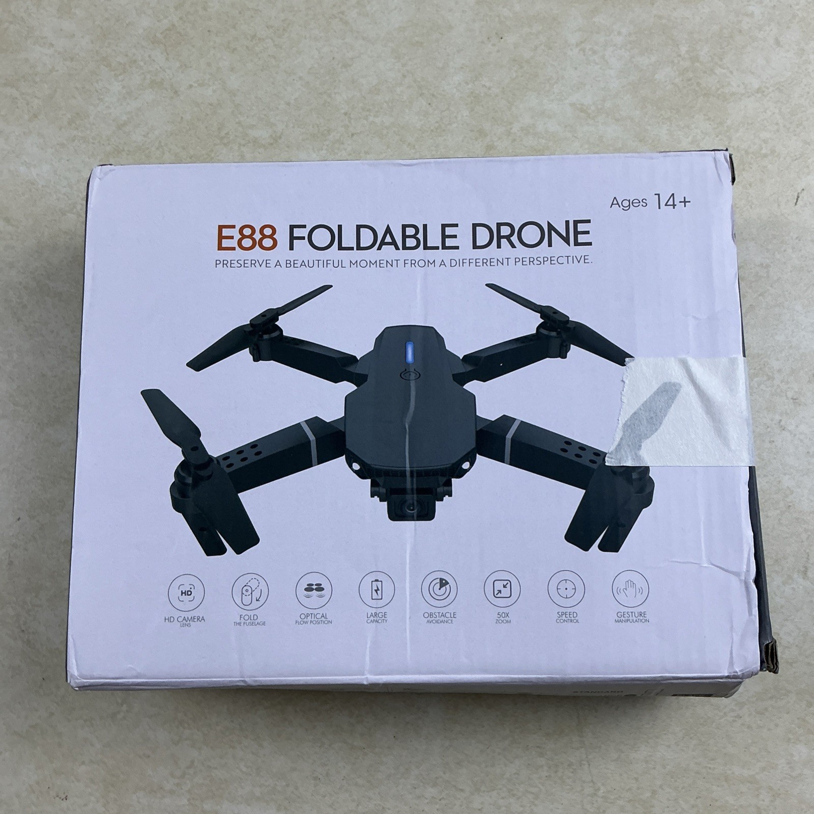 E88 Foldable RC Quadcopter with Camera, Toy Grade, Black Open Box