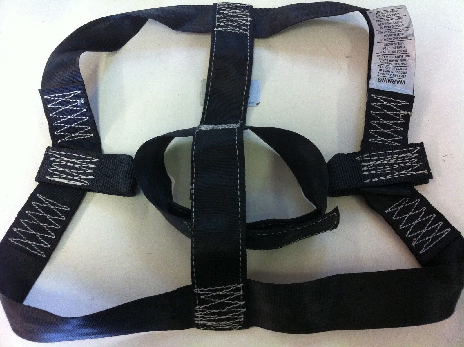 Rear wheel tie-down strap