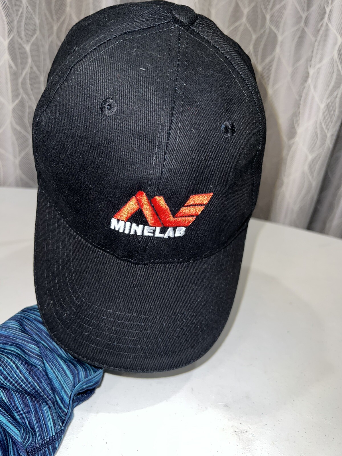 Minelab Logo Black with red white embroidery accents Hat Cap Strap Buckle EUC