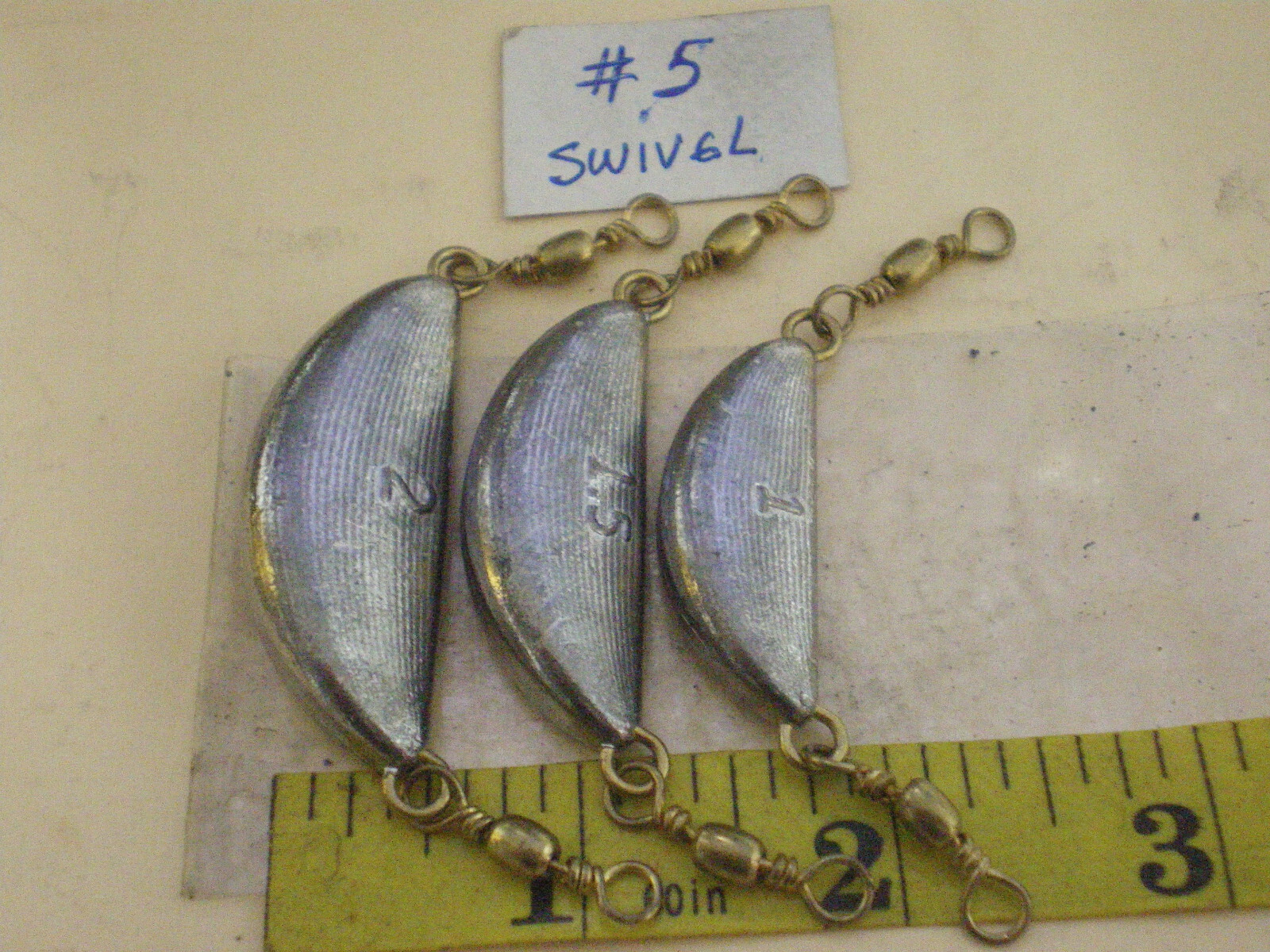 25 PCS. CRESCENT/BANANA SINKER, 1 OZ. W/#5 BRASS BARREL SWIVEL, GOOD QUALITY