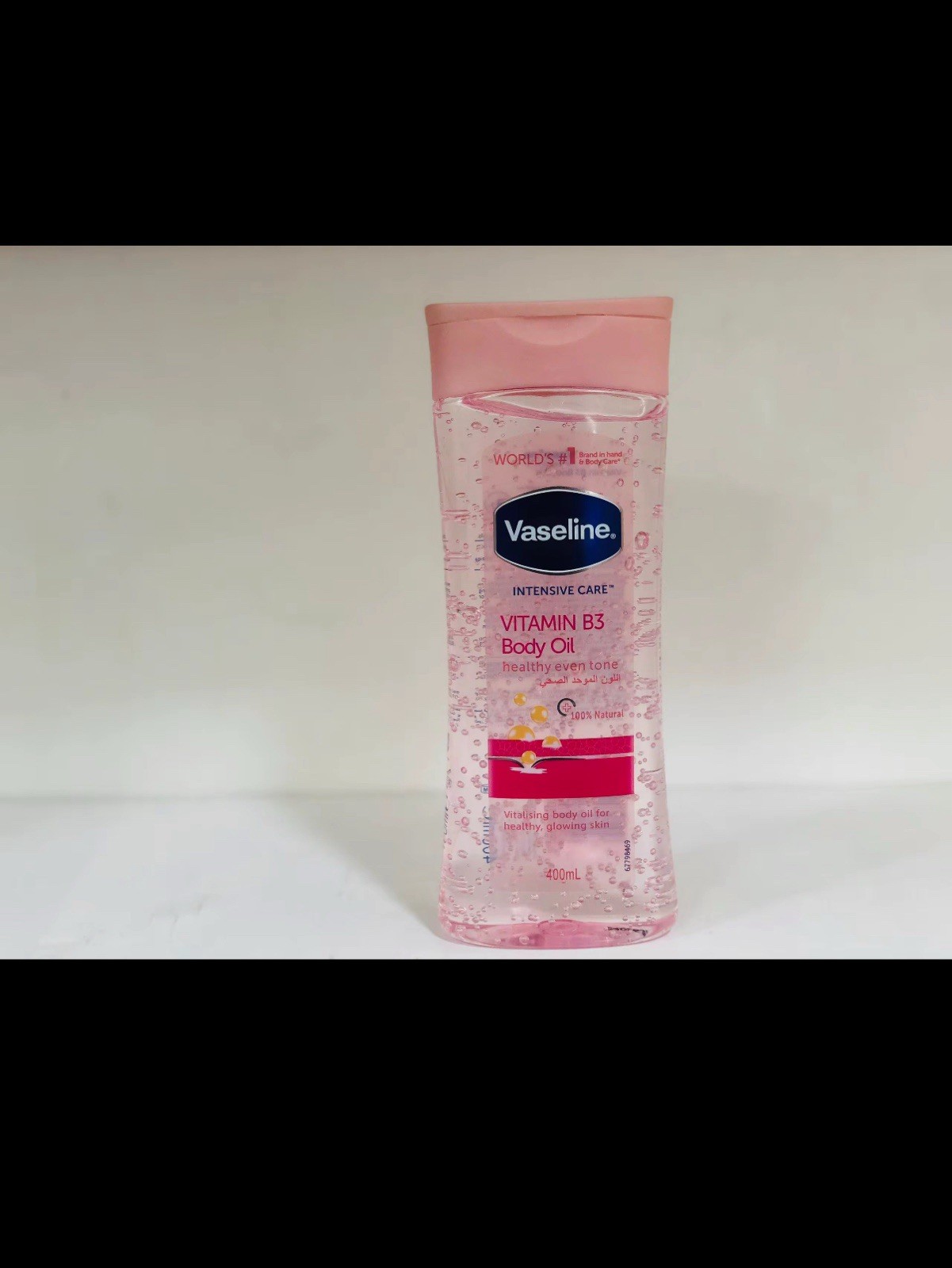 Pack of 3.  Vaseline Body Oil with Vitamin B3 a lightweight,