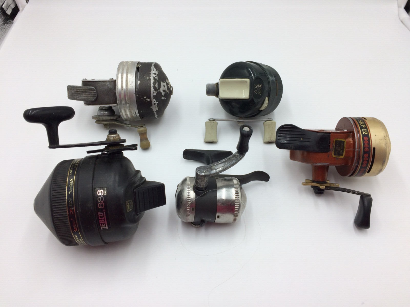 Lot of 5 Fishing Reels,Shakespeare Wondercast,SKP,Zebco 888,202,11 Triggerspin