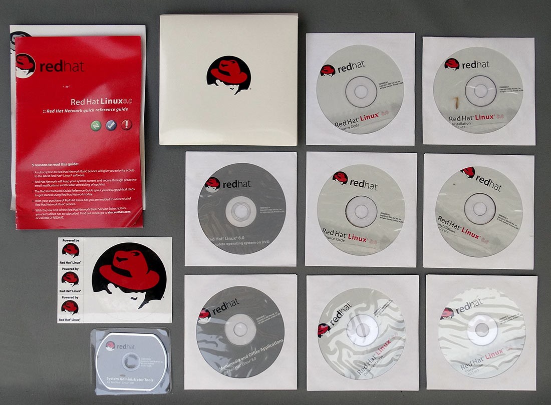 Red Hat Linux 8.0 Operating System CDs DVDs Stickers 2002 CD DVD