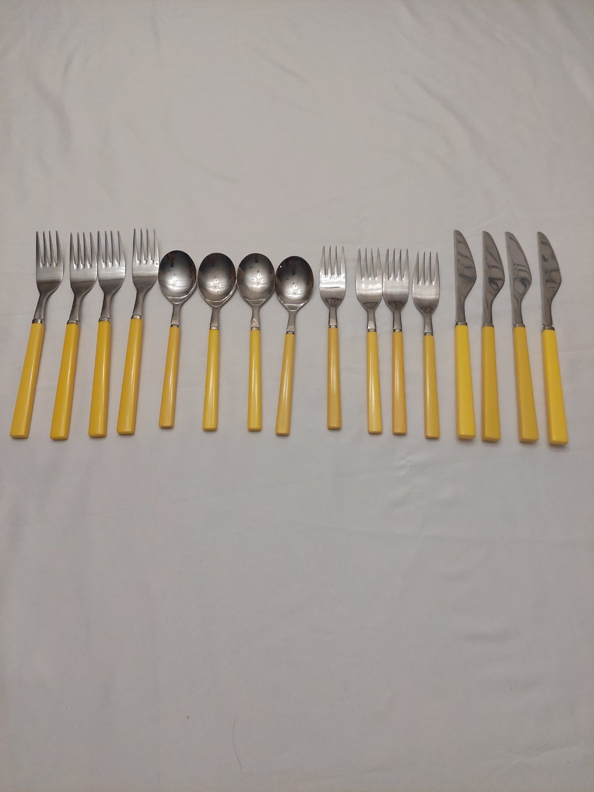 Vintage  16 Piece Anacapa Yellow Melamine Handle Stainless Flatware
