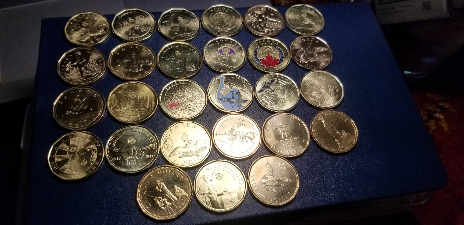 Collection Of 27 Different Beautiful Gem Coloured Canada Loon Dollars.