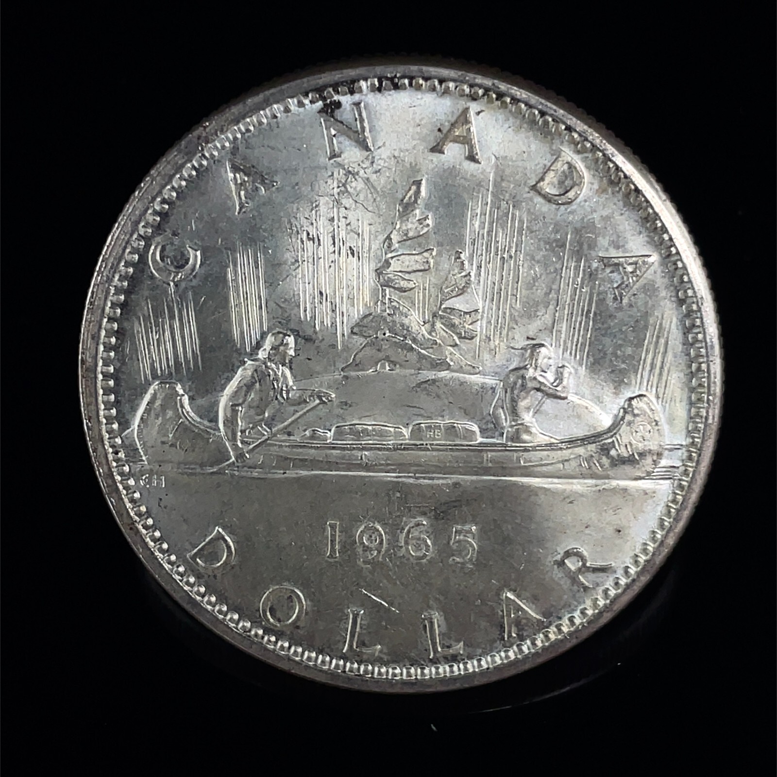 1965 PL Unc. $1 Canada Dollar .800 Silver Type 2 Small Beads Blunt 5.