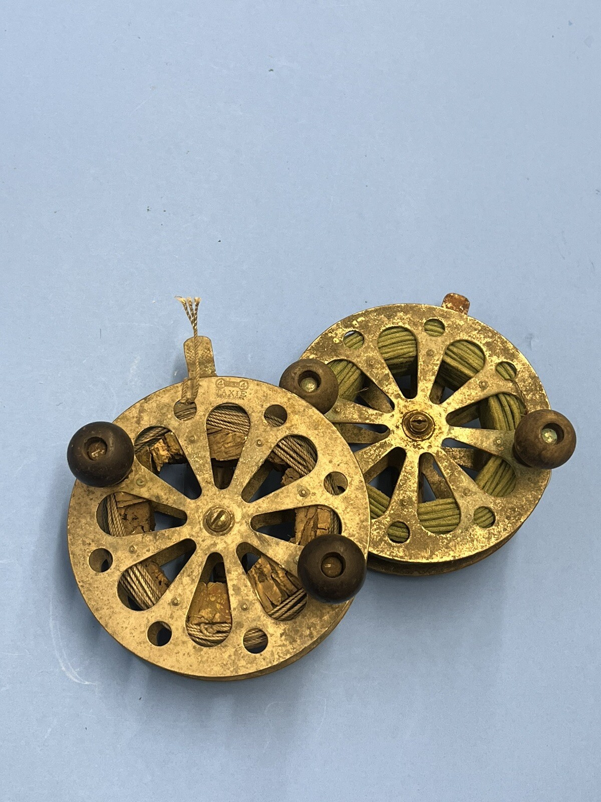 (2). 4 3/4 INCH THE FOUR BROTHERS TAXIE FISHING REEL - SKELETON REEL.