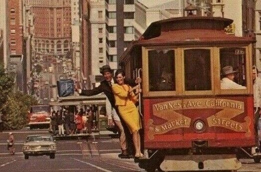 Postcard Passengers hanging on to a Cable Car in San Francisco, CA . S6
