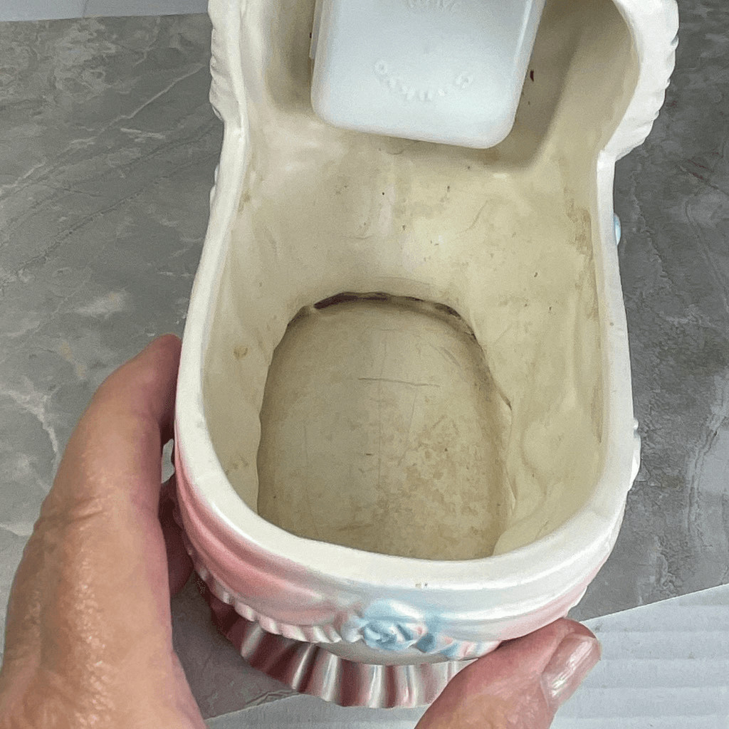 Inarco E- 3502 musical baby bassinet planter.