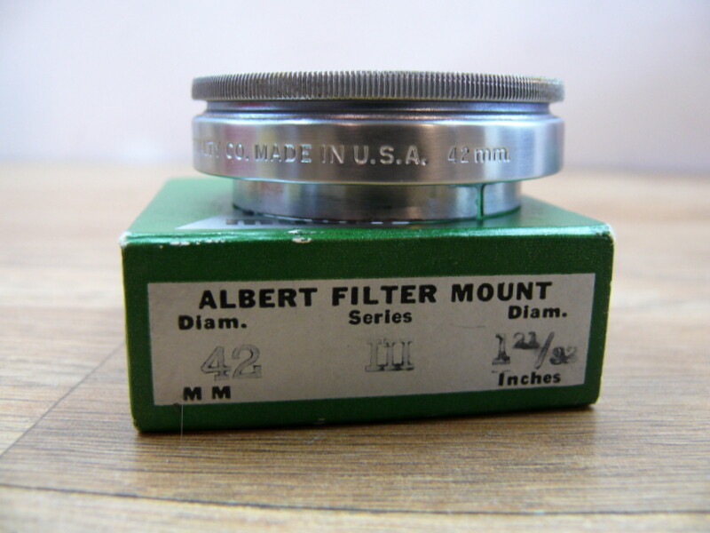 Albert 42mm filter adapter ring. Series III, 1 21/32 diameter in inches.