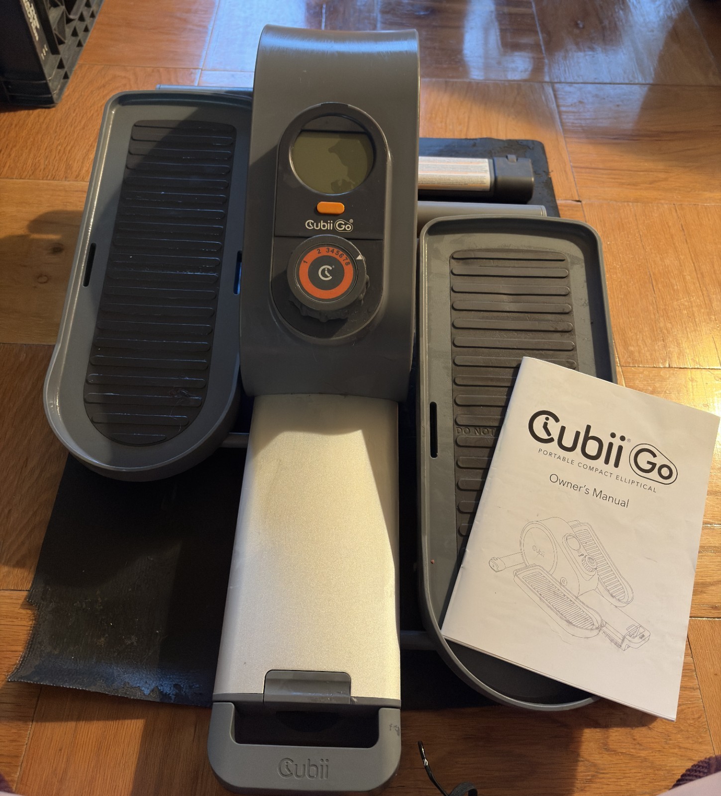 Cubii Go Portable Compact Seated Ellipitical Model F3A3 with orange accent color