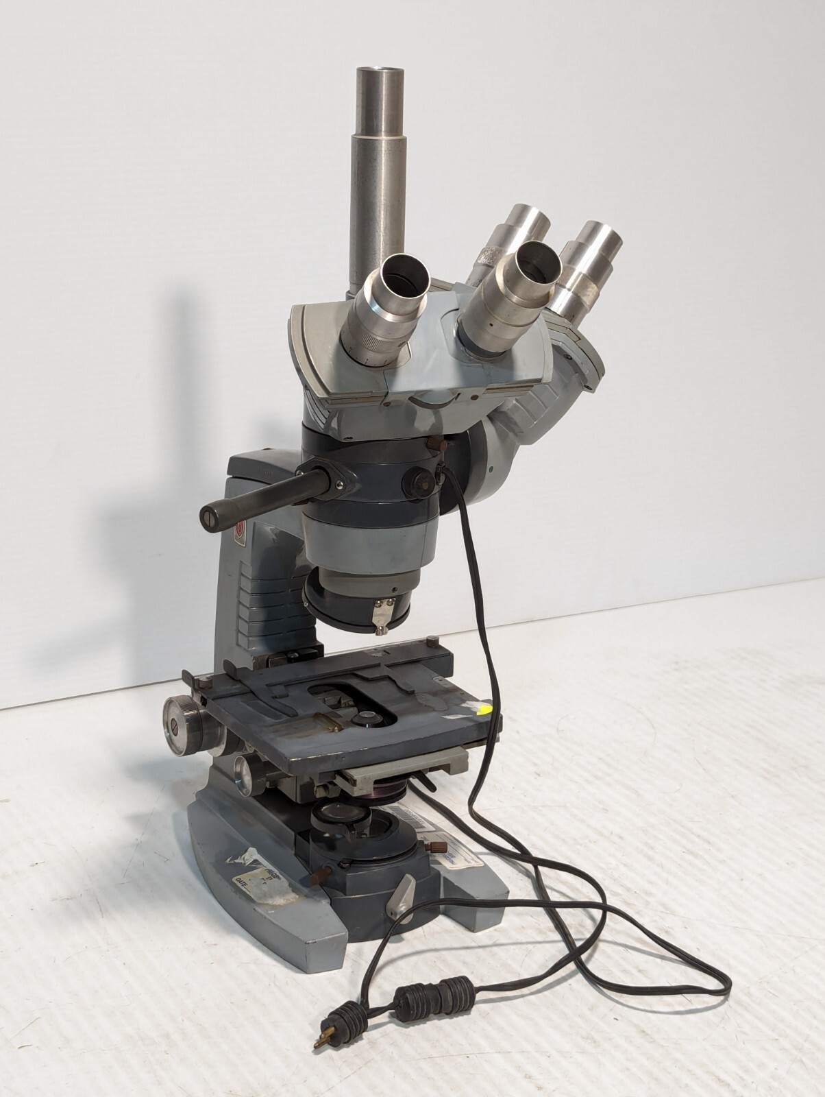 AO Spencer Dual Head Microscope with eyepieces and objective