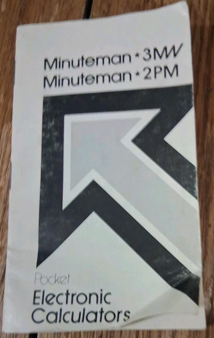 Commodore Minuteman 2-PM Hand Held Calculator W/ Case and Manual*. Untested
