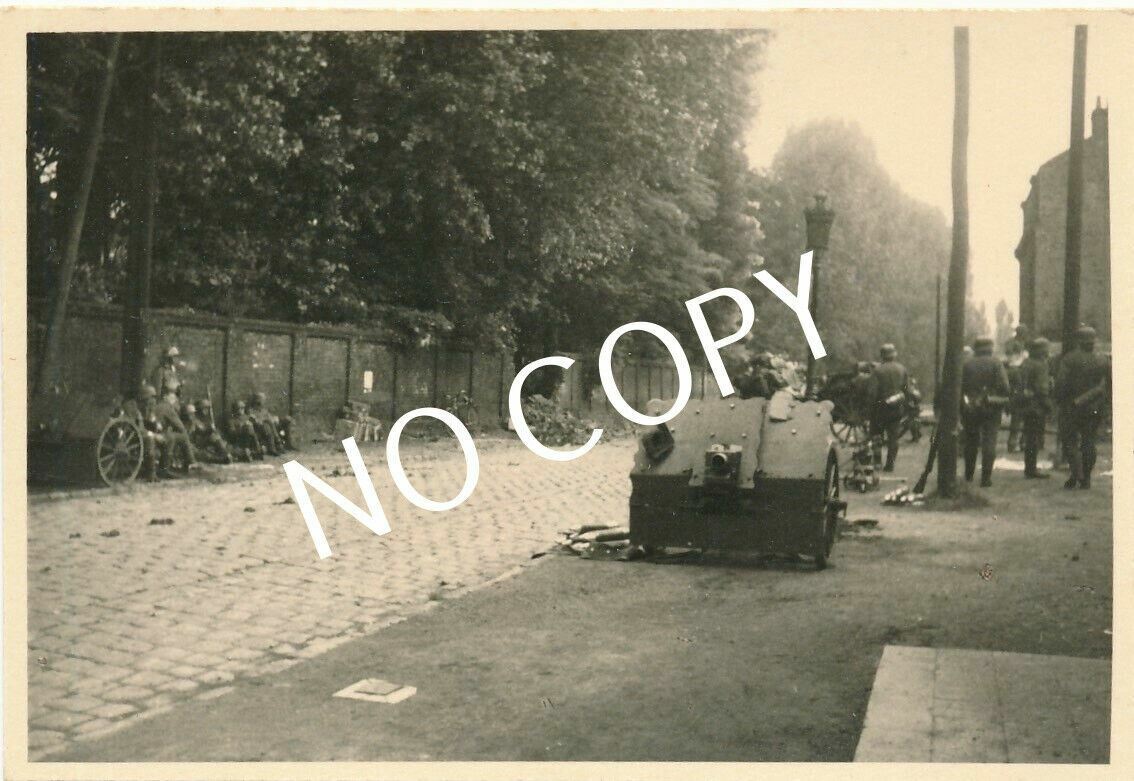 Photo WW II Gun Soldiers Street Scene France B 1.29