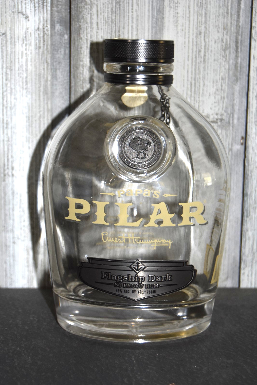 Papa's Pilar Ernest Hemingway Rum Bottle, Rooster Metal Logo, Sun Dial Chain Cap