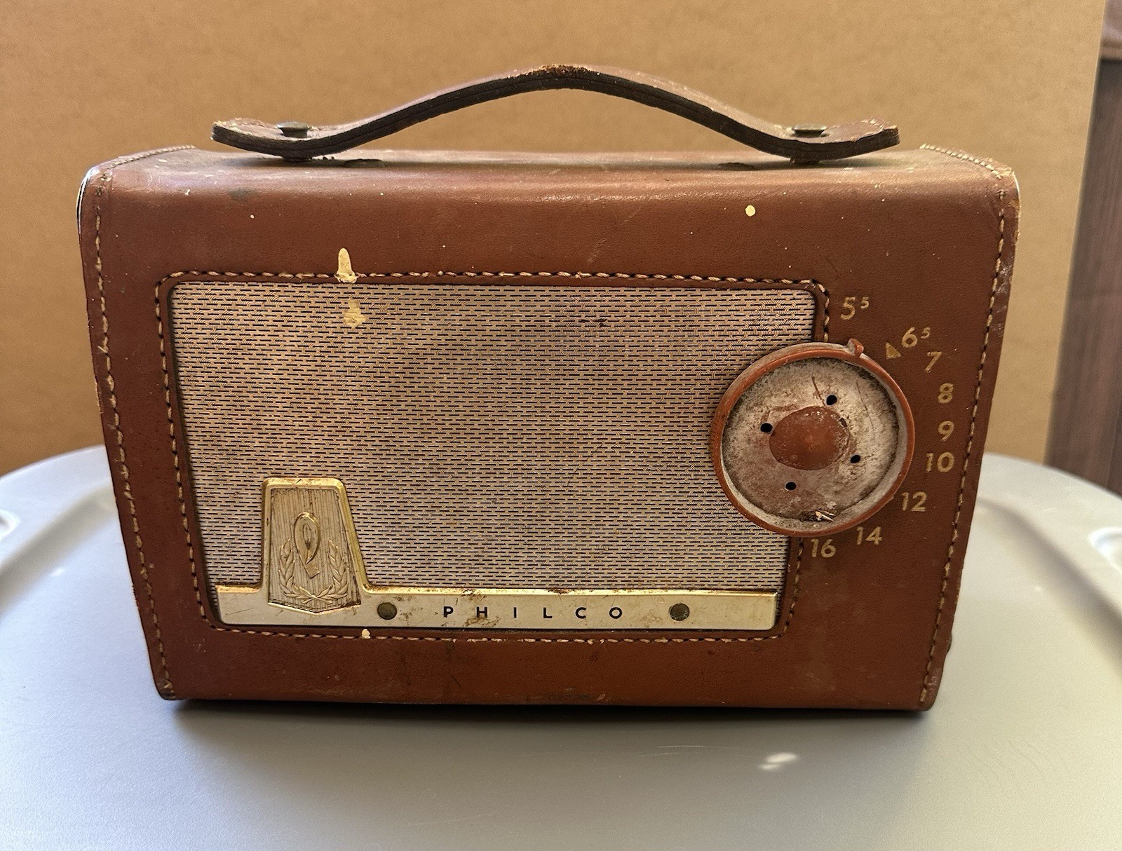 1956 Philco E-675-124 ‘The Sportster’ tube-type AM Radio, leather case