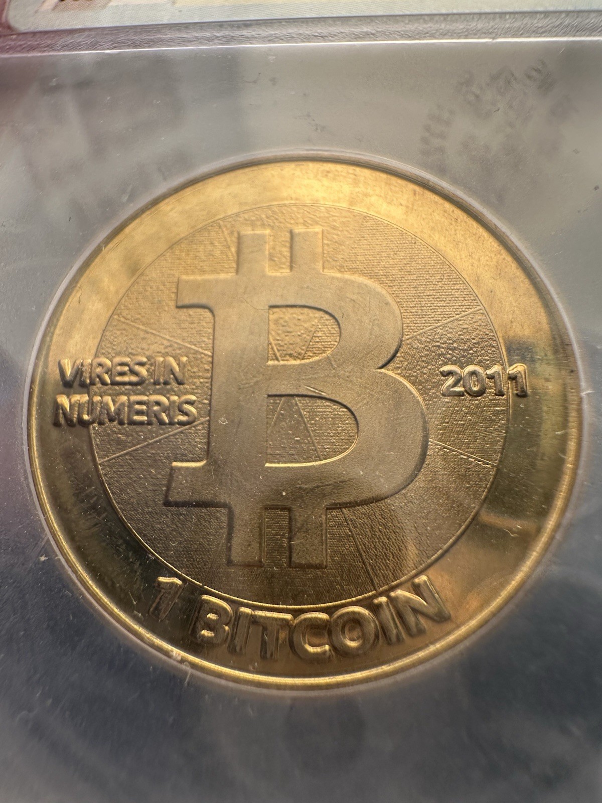 2011 Casascius physical bitcoin REDEEMED with holo in place