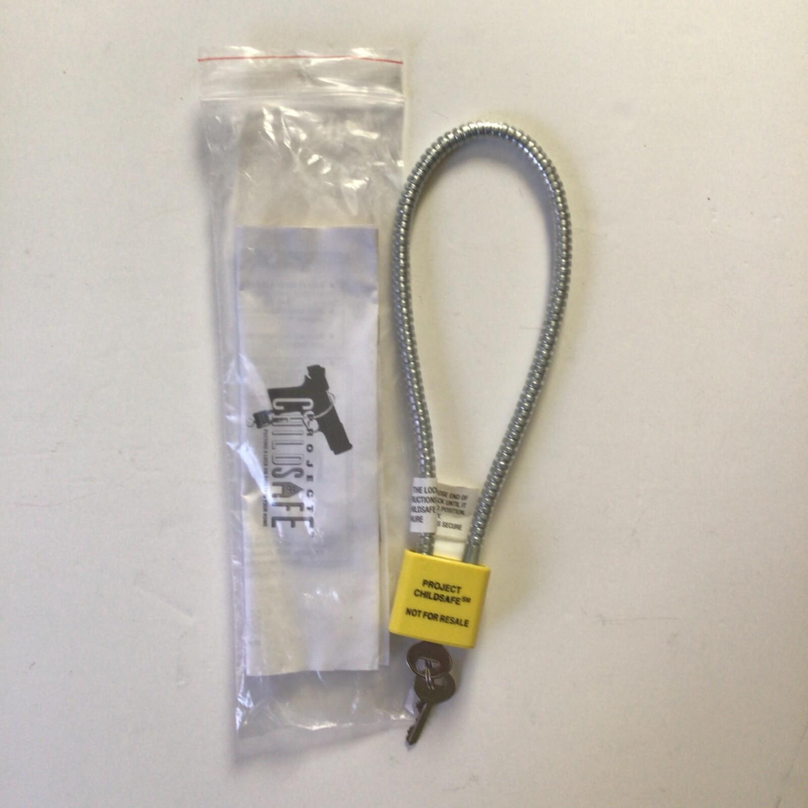 1 pc Gun/bicycle lock.Project child safe. New packaged 2 keys.