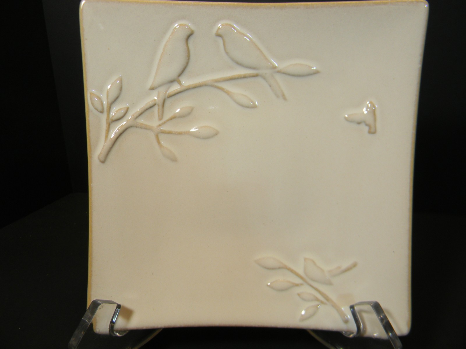 trinket dish featuring 2 birds on a branch, used condition, 6 inches w & 6 long
