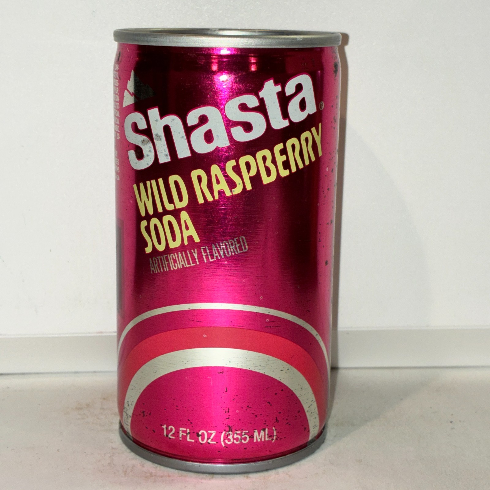 Shasta Wild Raspberry Soda can, crimped steel, bottom opened