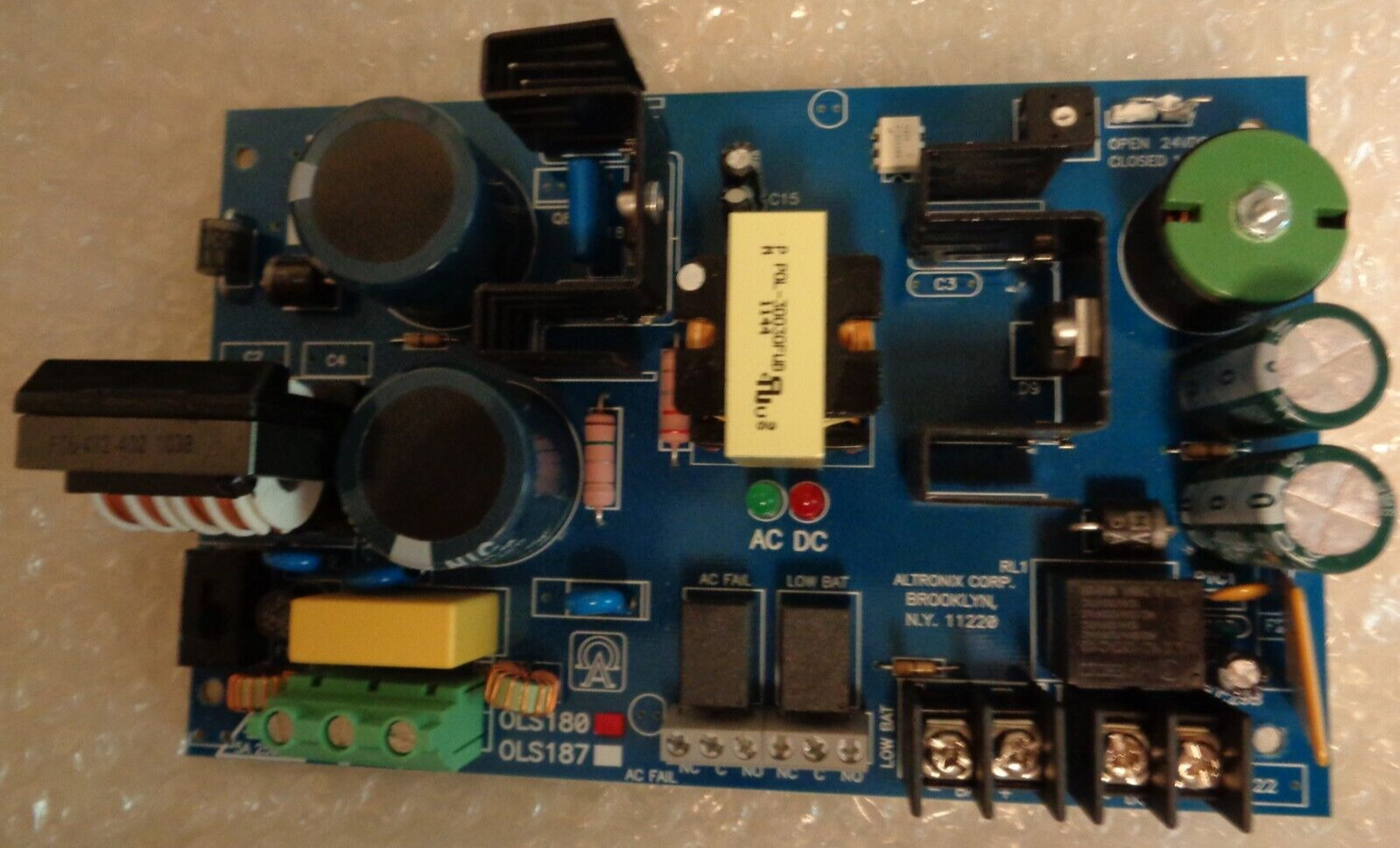 ALTRONIX OLS 180 POWER SUPPLY / CHARGER 12VDC/24VDC @ 6 AMP