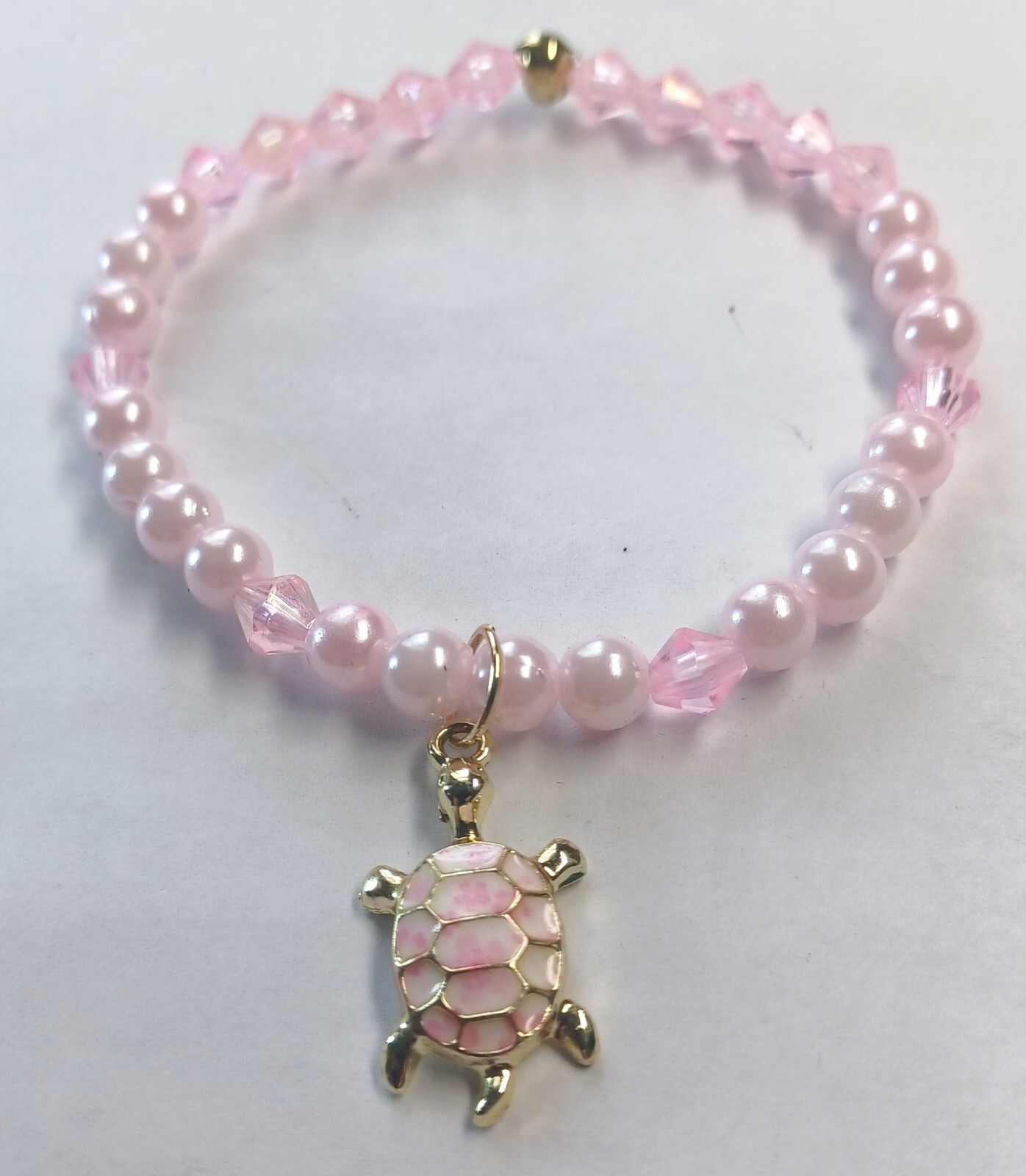 Pink Beaded Bracelet and Turtle Charm