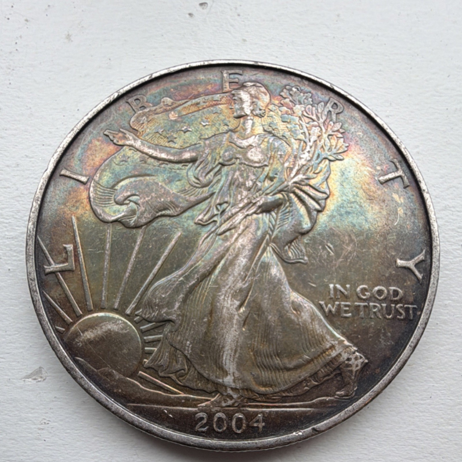 U.S. Mint 2004 $1 American Eagle 1 oz Silver Uncertified - beautifully toned.