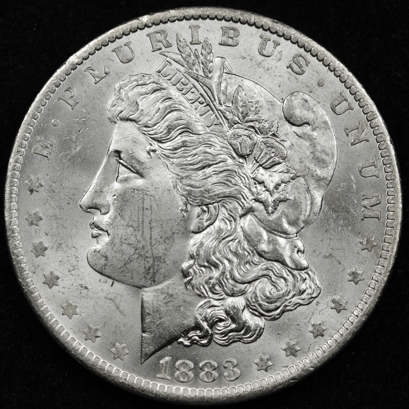 1883-o Morgan Silver Dollar.  Full Chest Feathers.  B.U.*   (Inventory A)