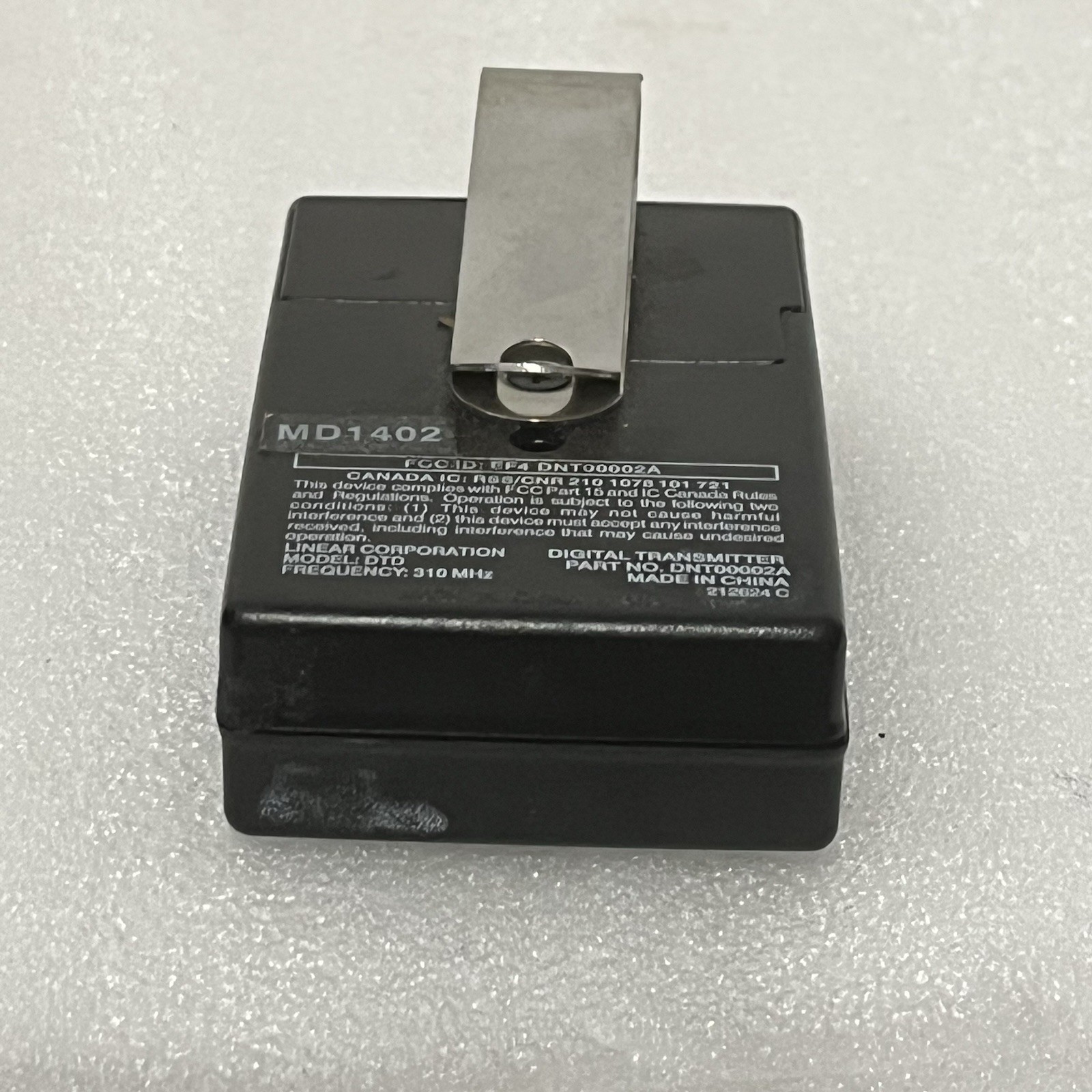 Linear DNT00002A Garage Door Gate Remote 310MHz 1 Button Visor Clip