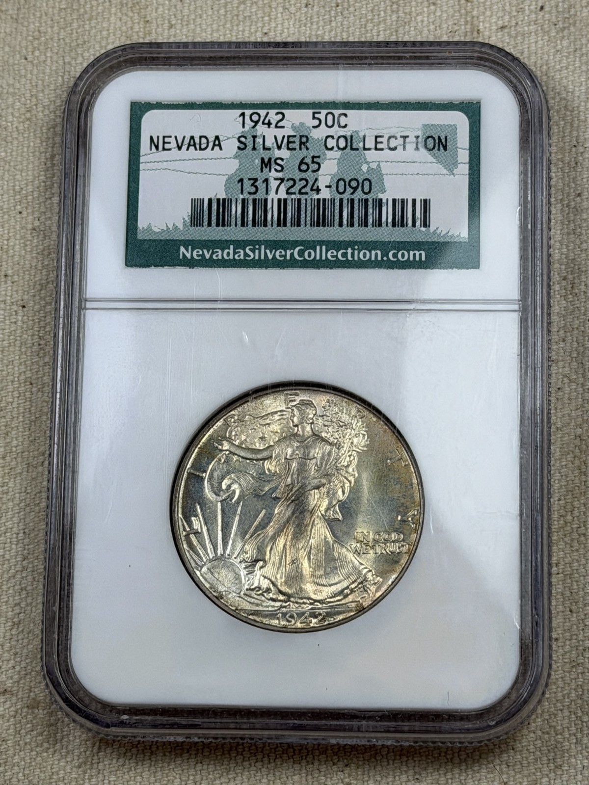 1942 Walking Liberty Dollar Nevada Silver Collection NGC MS-65 Cool Toning