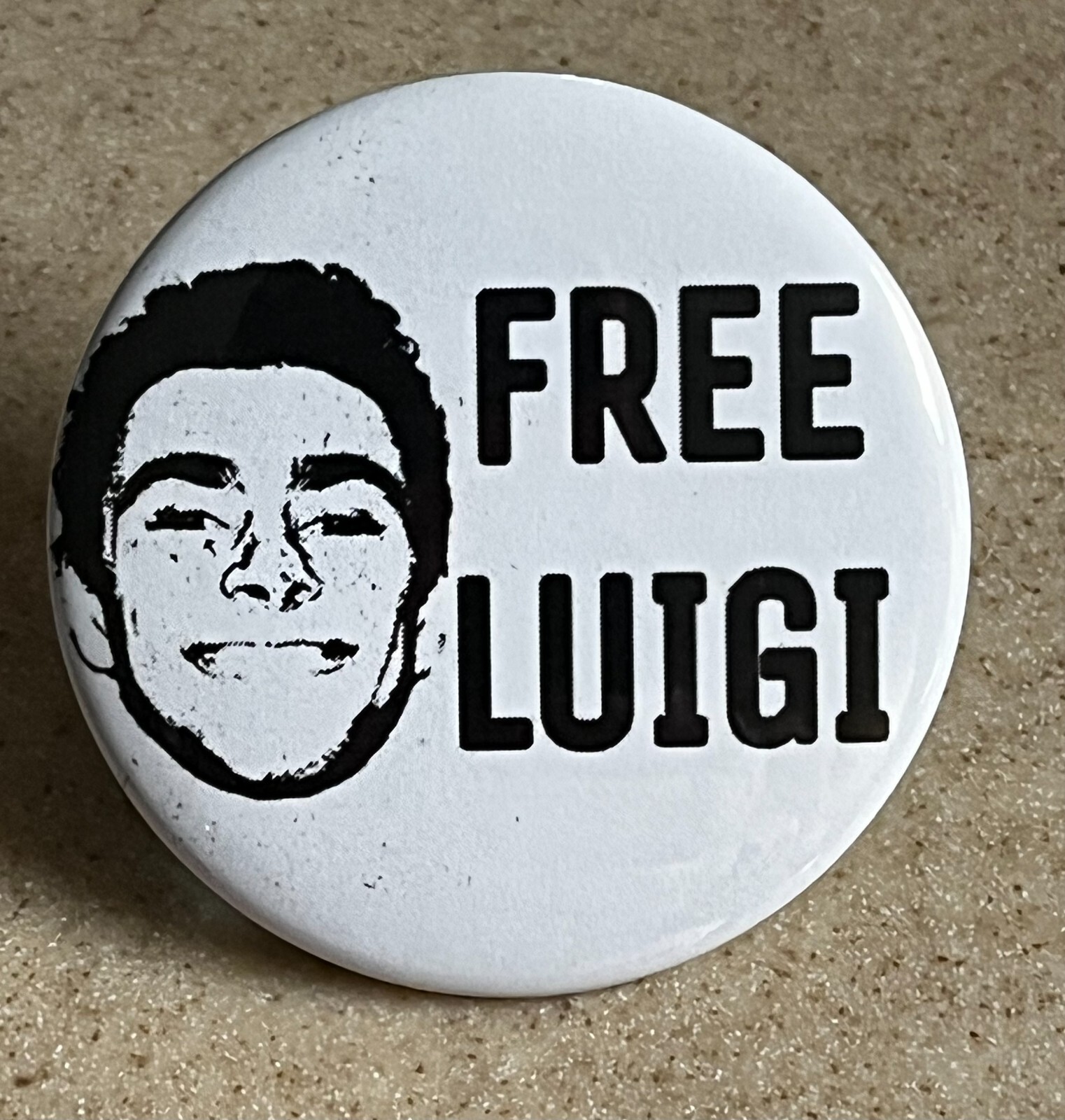"Free Luigi" Magnet, 2 1/4 inch.