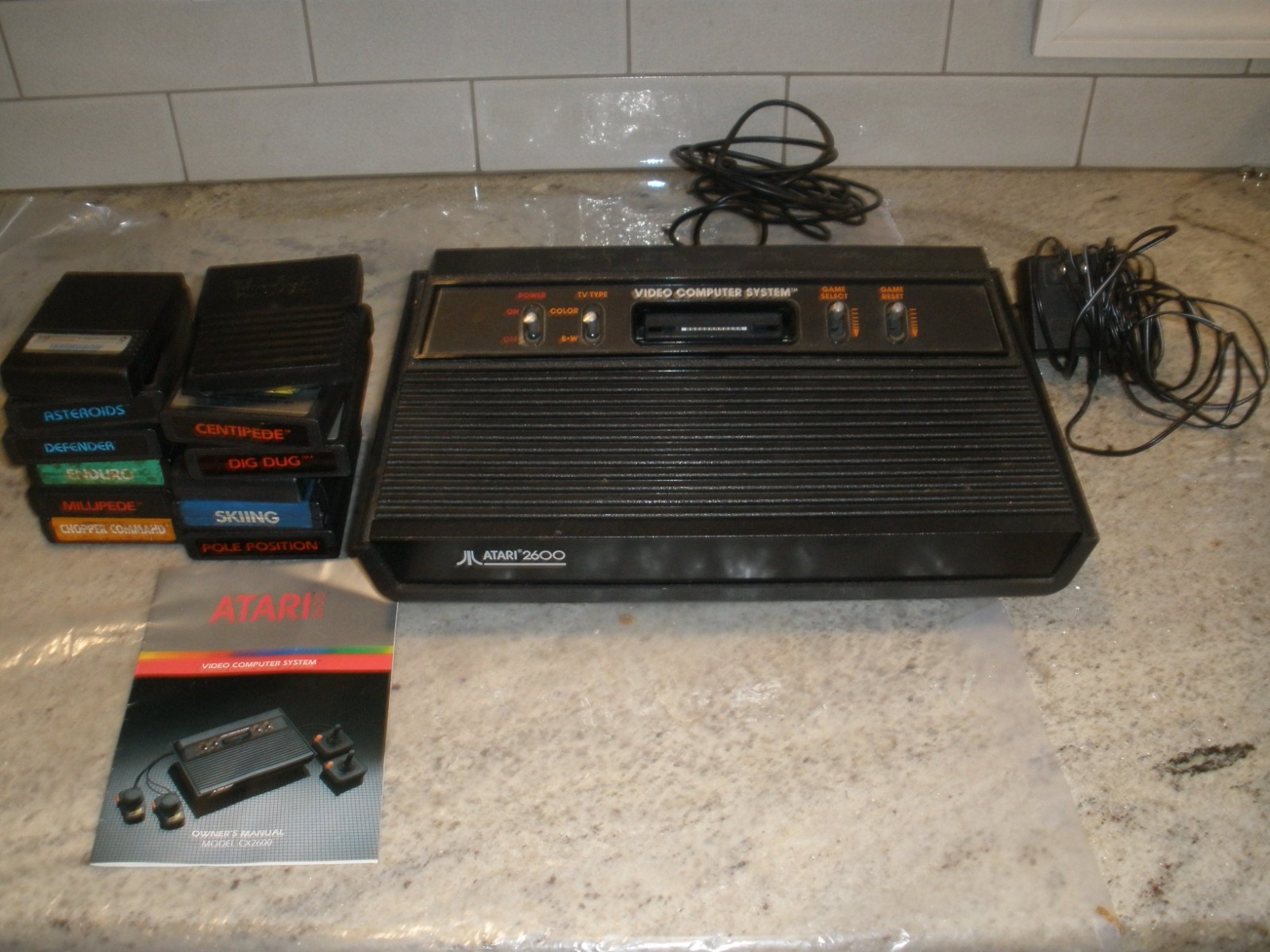 ATARI 2600 VIDEO COMPUTER SYSTEM CONSOLE WITH GAMES CABLES TESTED WORKS