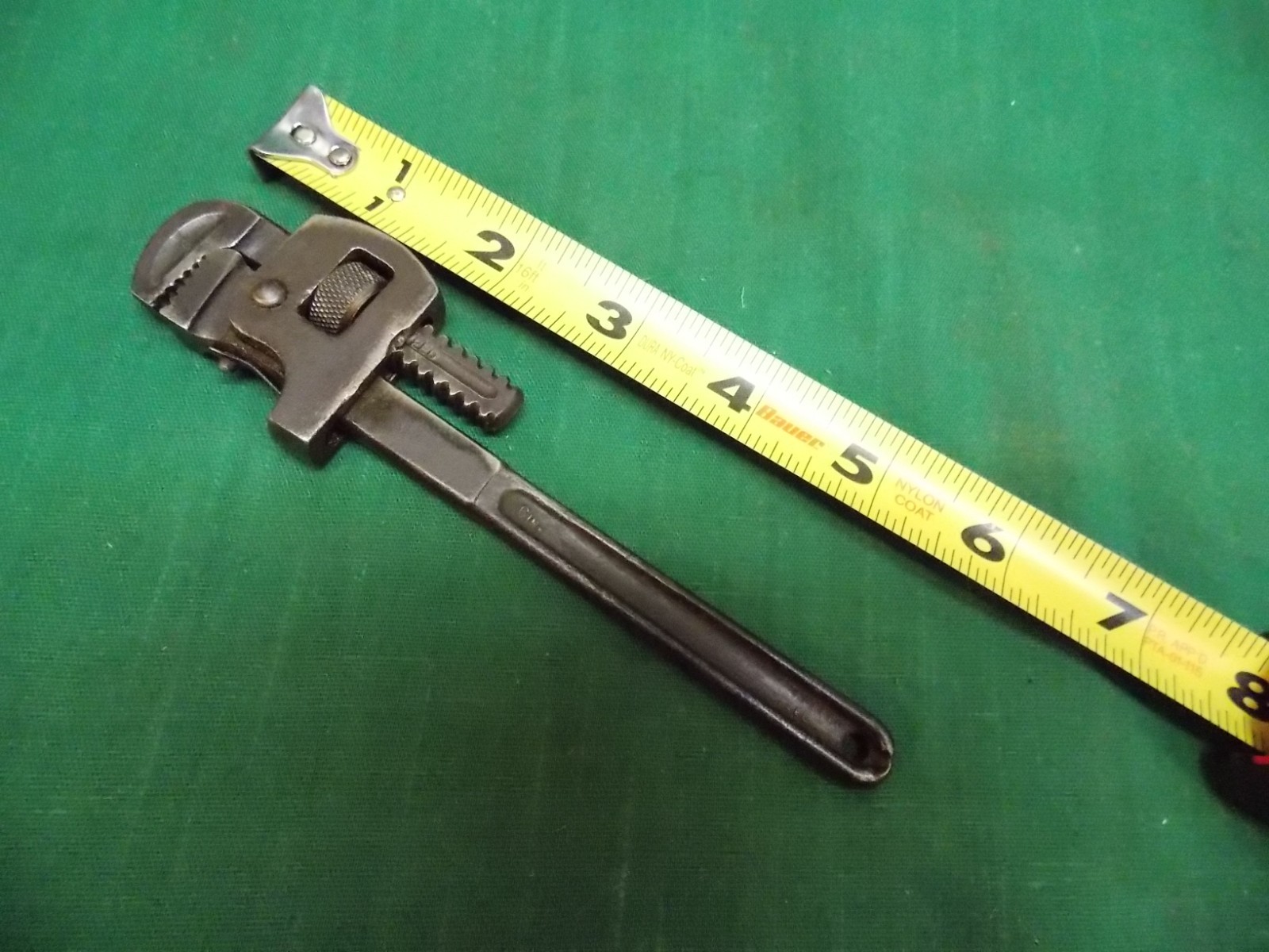 Vintage unbranded 6" pipe wrench. Marked: GUARANTEED FORGED STEEL R118