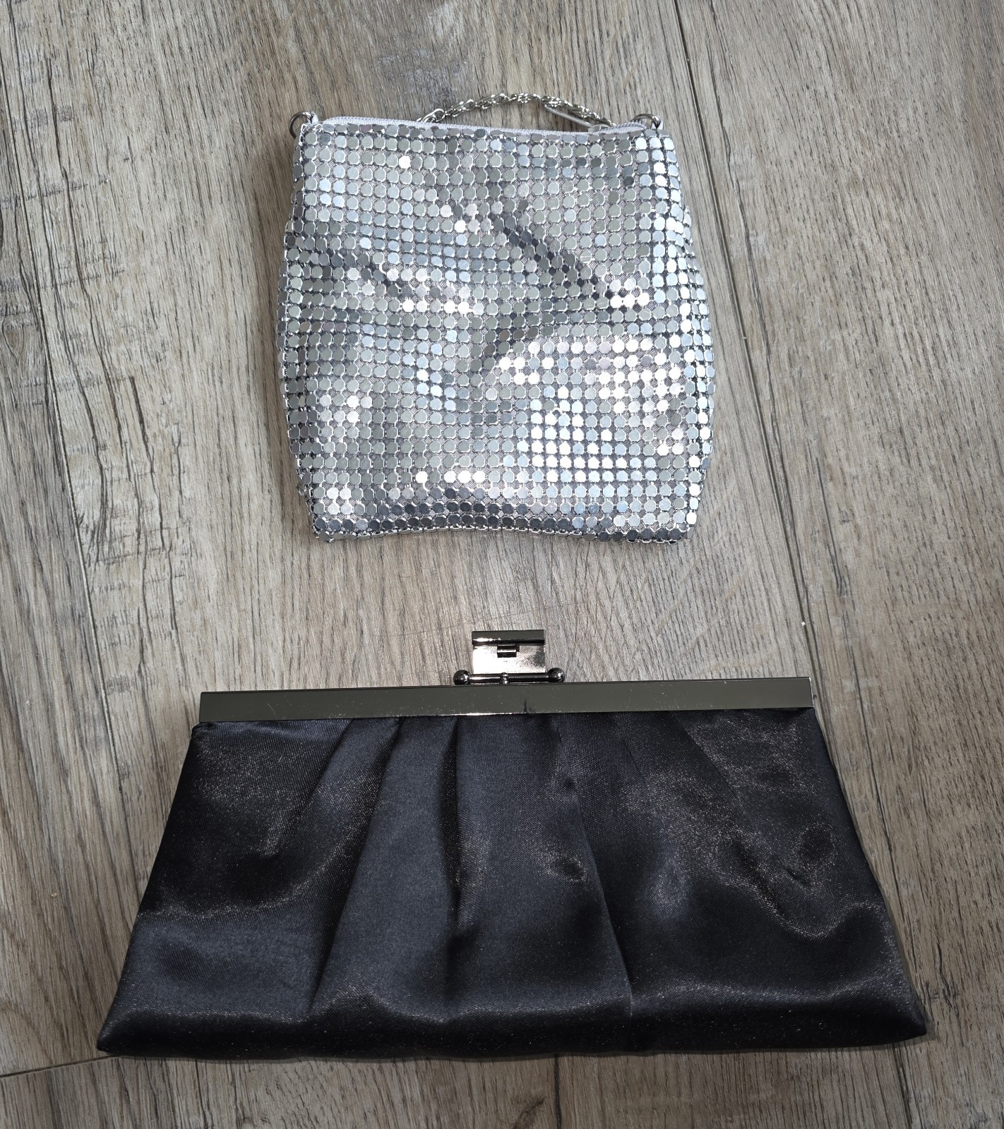 Pair of Clutch Purses featuring a Silver Metal Mesh Pouch and a Black Elegant