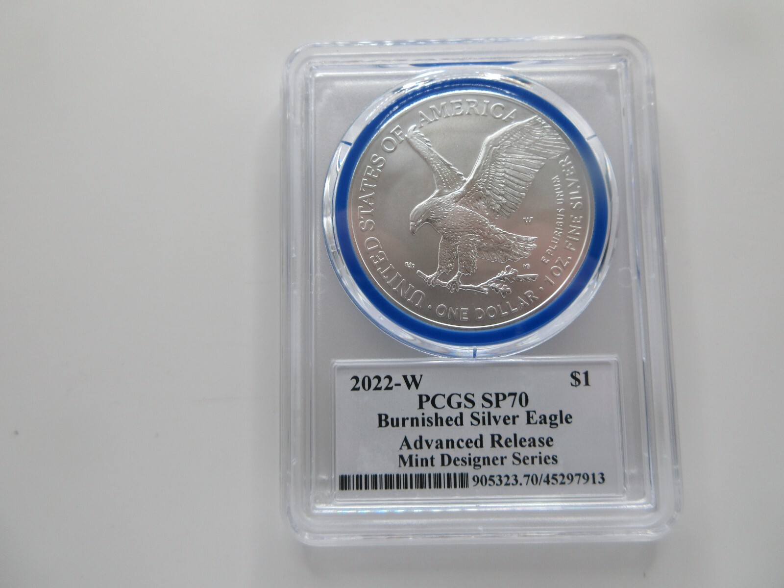 2022-W Burnished Silver Eagle Advanced Release; Mint Designer Damstra PCGS SP70