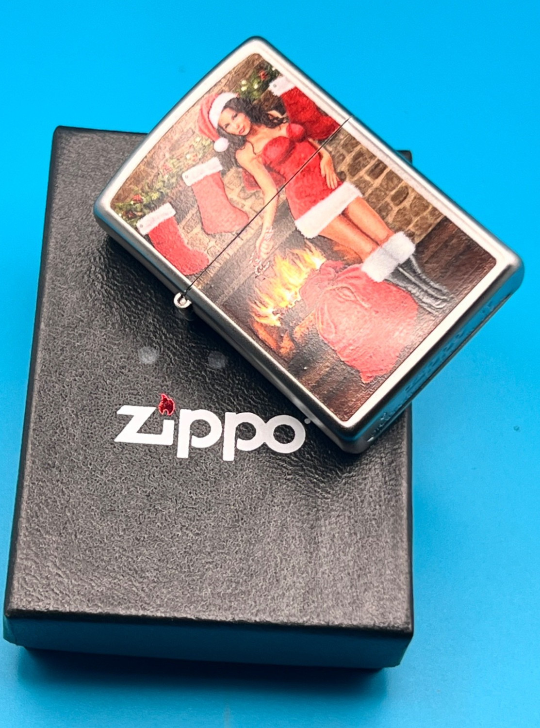 Genuine Brand New 2017 ZIPPO Lighter PULLING A CRACKER BY THE FIRE Satin Chrome