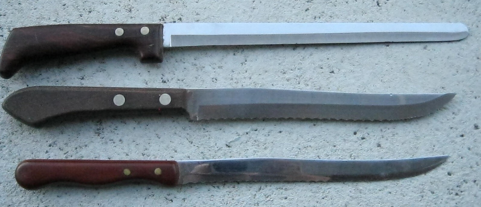 VINTAGE EKCO ETERNA, ONEIDA, & WEST BEND USA BREAD & CARVING KNIVES, LOT OF 3