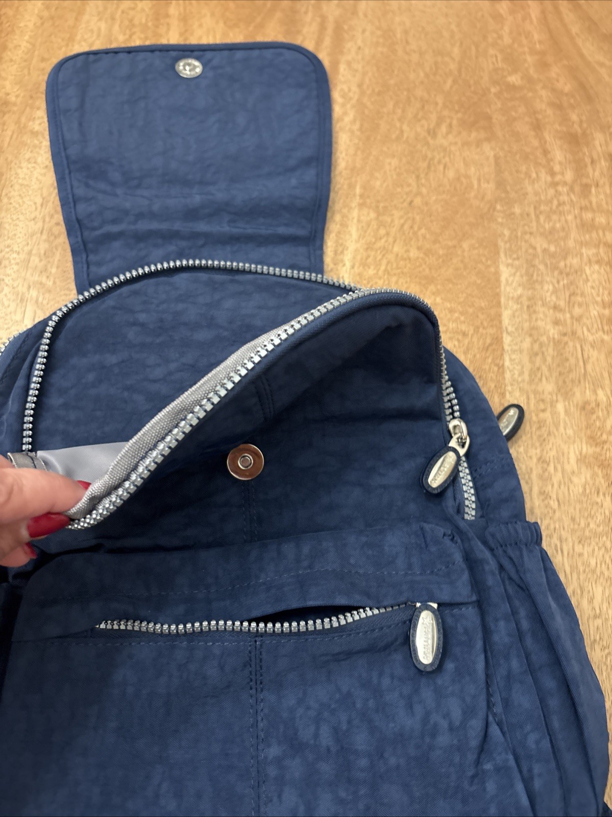 Aotian Medium Backpack Preowned, But Never Used, Gender Neutral, Navy Blue